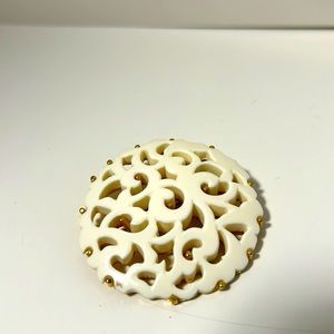 Monet brooch vintage filigree gold tone white cut out design 2 “